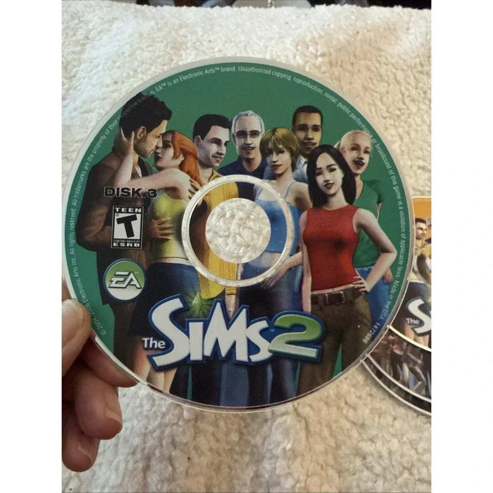 The Sims 2 (PC, 2004 - 5 Discs) Complete No Manual Pre Owned Case Needs Work